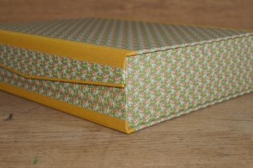 Modern crate with a hinged lid with an interesting design